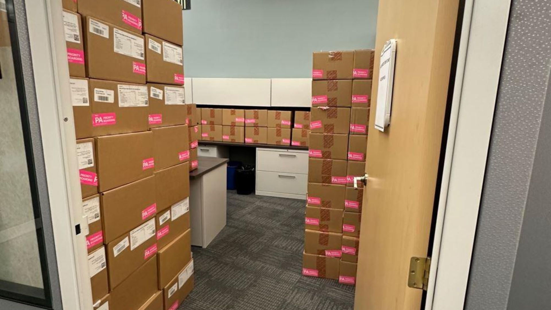 Computer monitors servers and office technology prepared for a business move