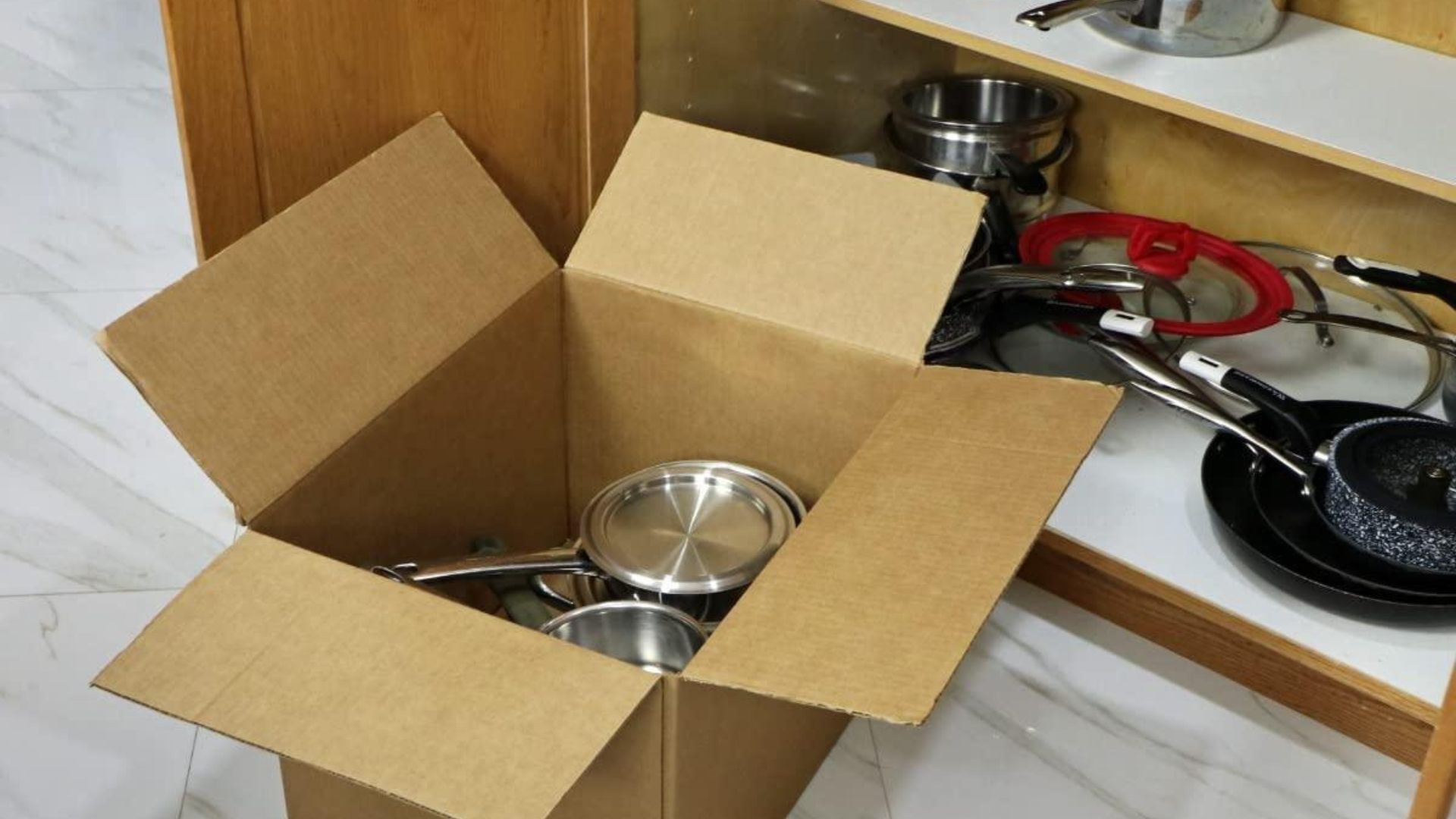 Office equipment documents and furniture being packed for a business move