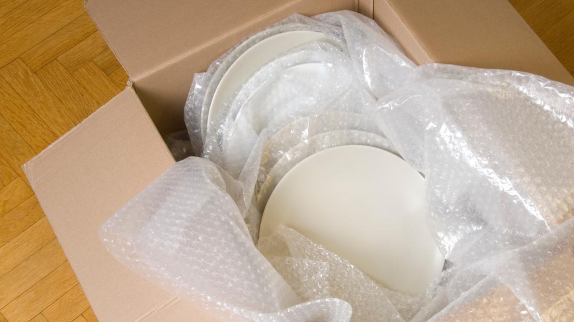 Happy family settling into a new home after using professional packing and unpacking services