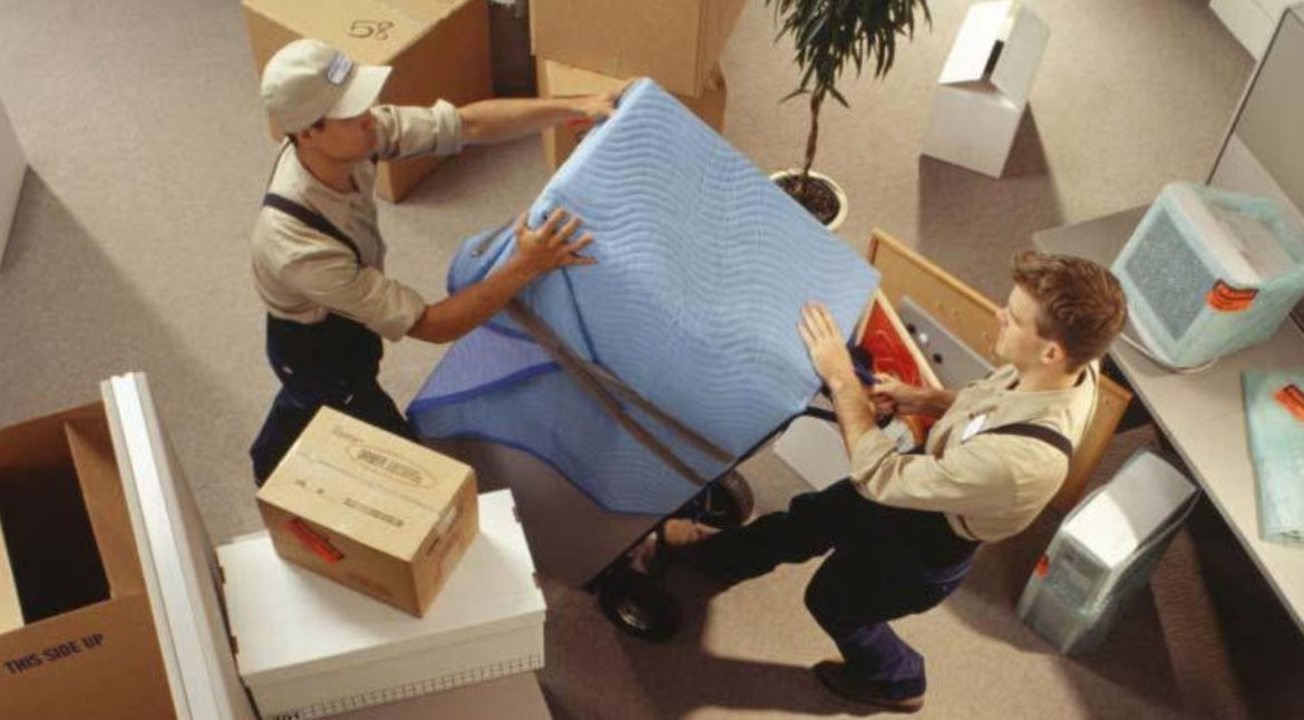 Commercial movers completing an after-hours office move to reduce business disruption