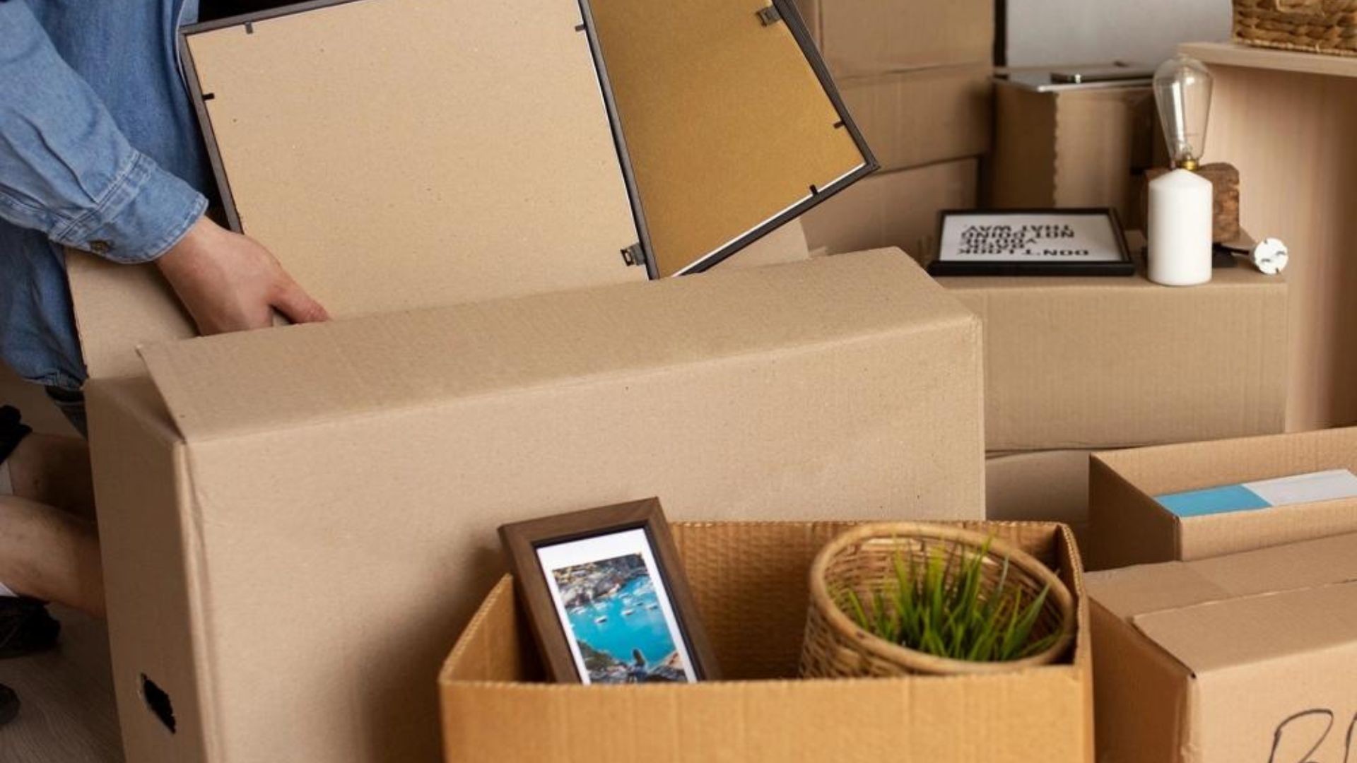 Labeled moving boxes organized by room for efficient unpacking