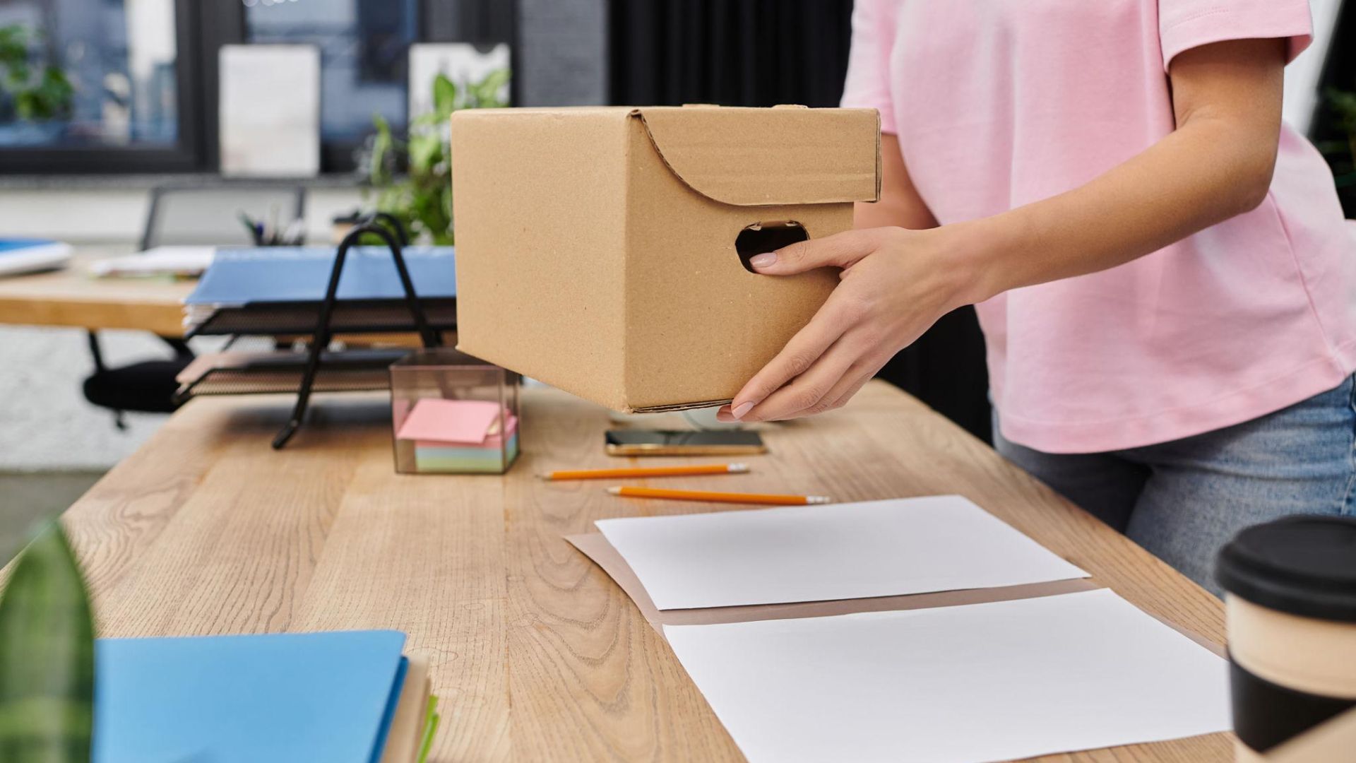 Employees coordinating office relocation plans to minimize downtime