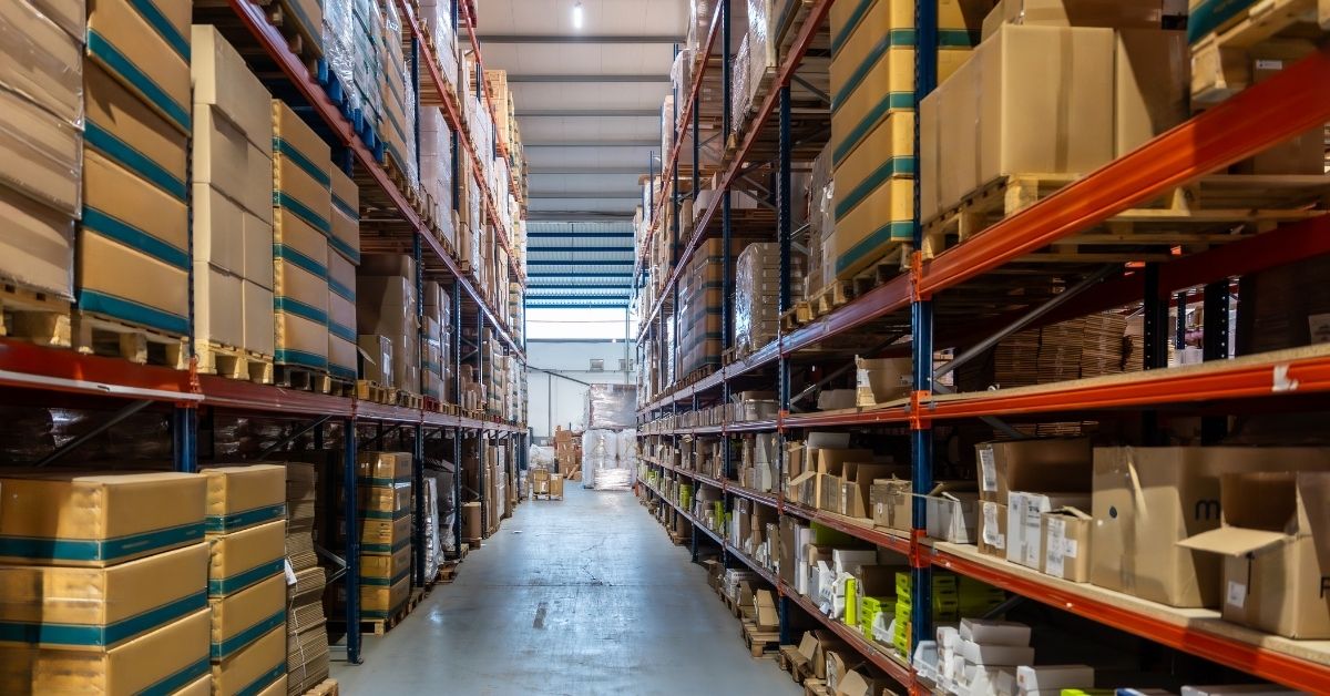Logistics team planning warehouse relocation to maintain inventory accuracy and operational continuity